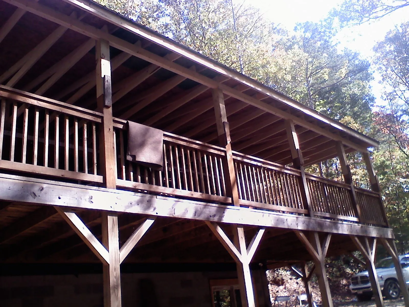 Timber framing under a new elevated porch and deck — Roof Leak Repair in Warner Robins by Roofing Brothers